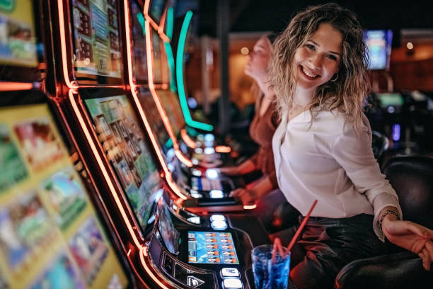 Mobile phone displaying live casino interface with multiple dealer options